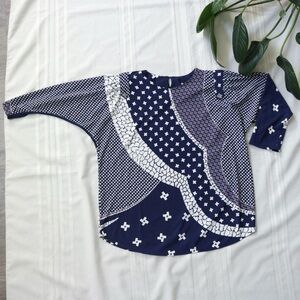 80's style blue and white patterned blouse